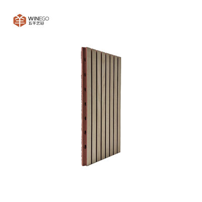 Stylish Acoustic Treatment With Grooved Wooden Panels For Modern Architecture