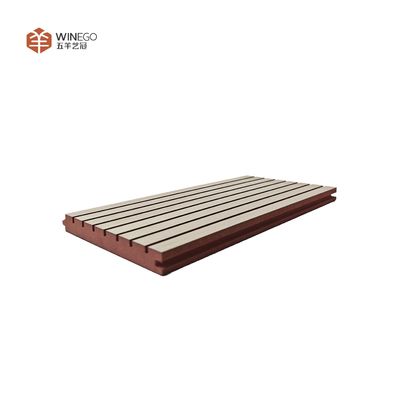 Stylish Acoustic Treatment With Grooved Wooden Panels For Modern Architecture
